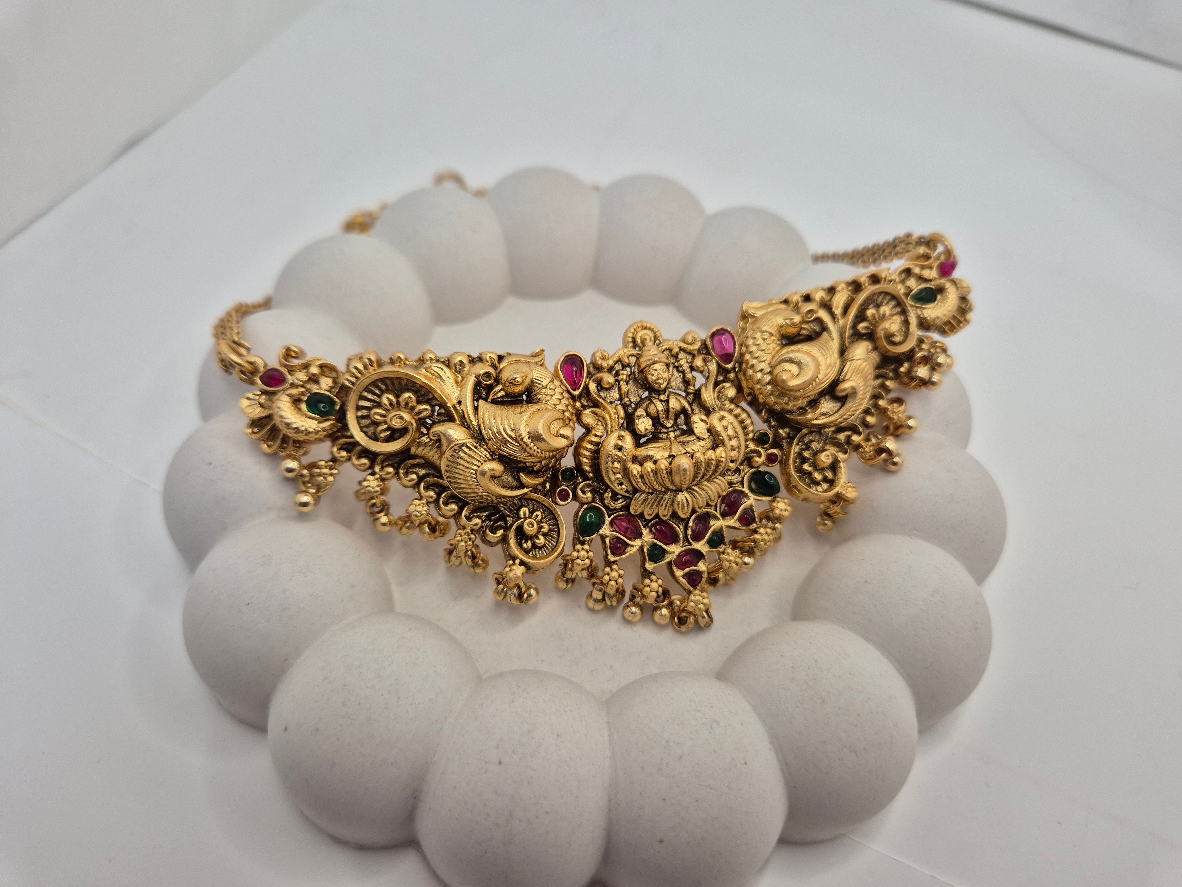 Women Red & Green Gold-Plated Stone-Studded Temple Choker Jewellery Set